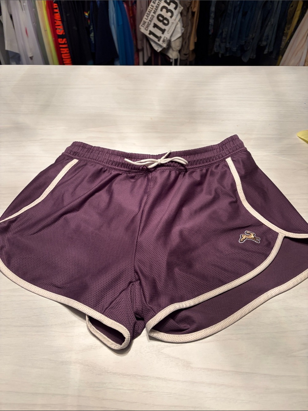 Tracksmith Plum Mesh Athletic Shorts with Cream Trim